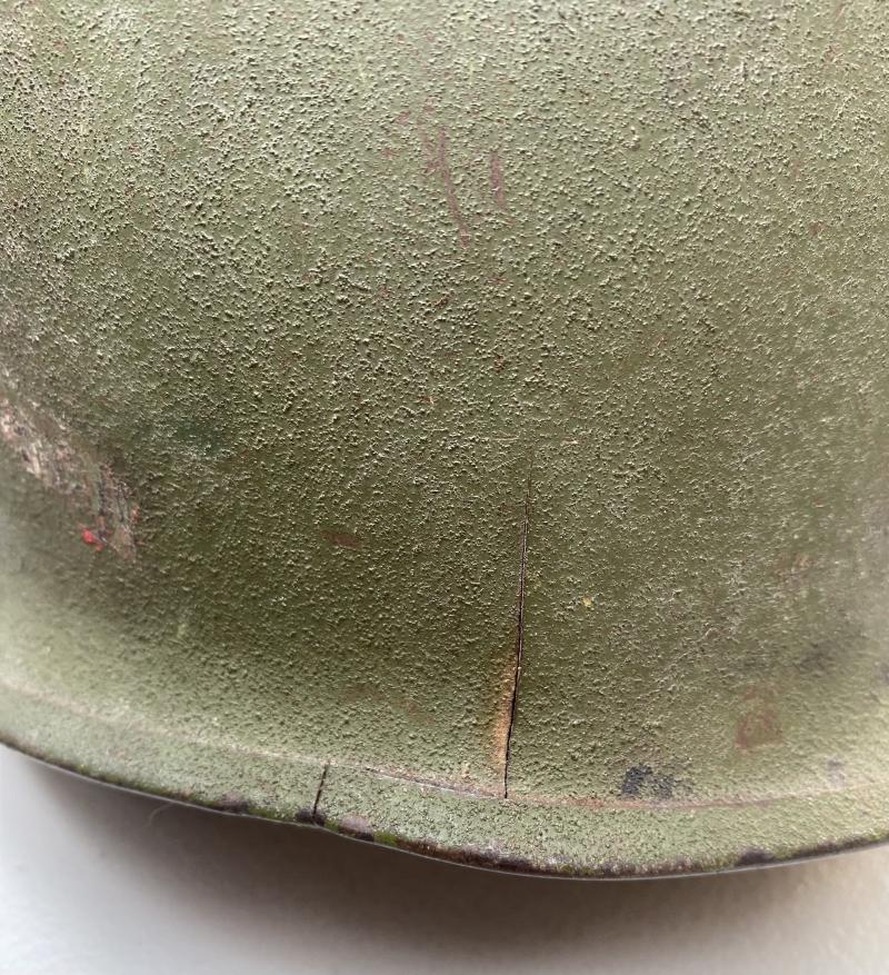 BATTLE DAMAGED US M1 HELMET - VIETNAM